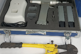 An orthopedic tool kit containing a drill, wrenches, and assorted tools, showcasing the Shree Danev Foundation's resources.